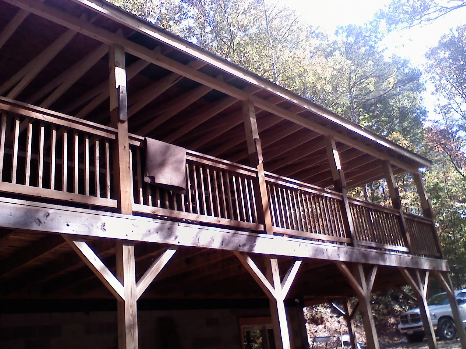 Timber framing under a new elevated porch and deck — Roof Leak Repair in West Springfield by Roofing Brothers